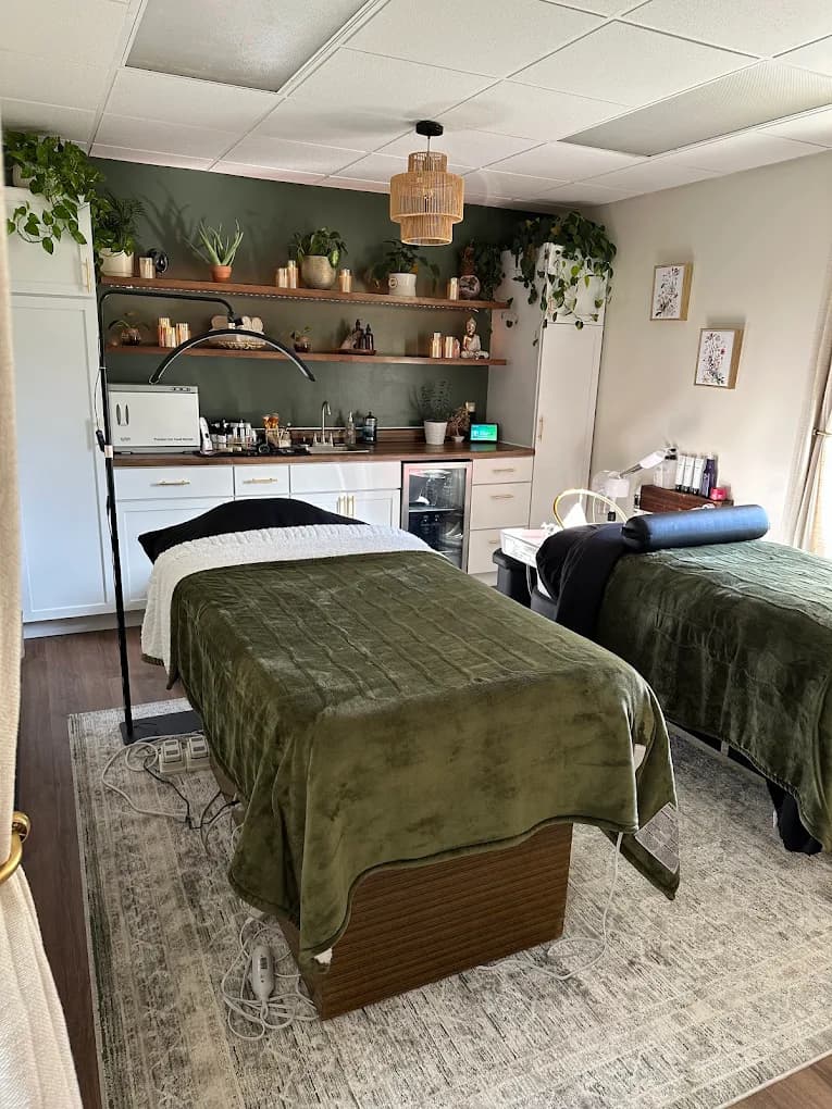 The calm, plant-filled treatment room at Skin + Soul near Jackson, MI